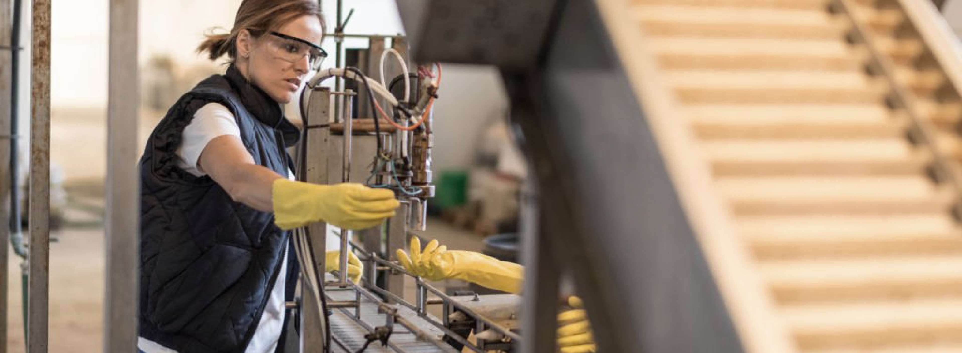 Woman doing Maintenance on manchinery